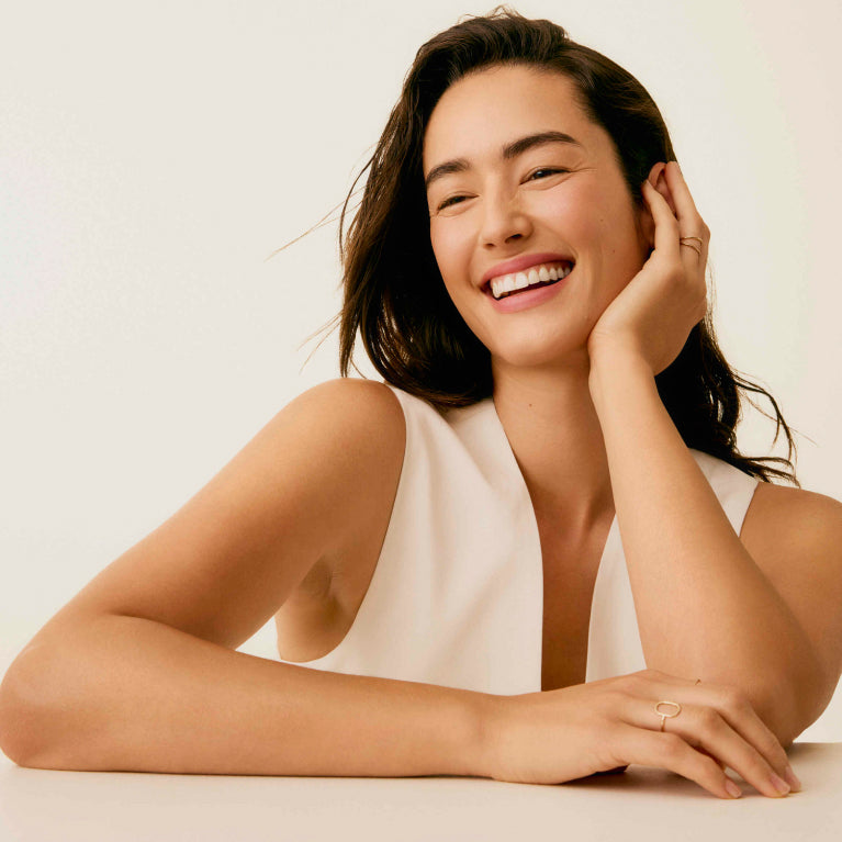 Smiling woman in a clean beauty portrait